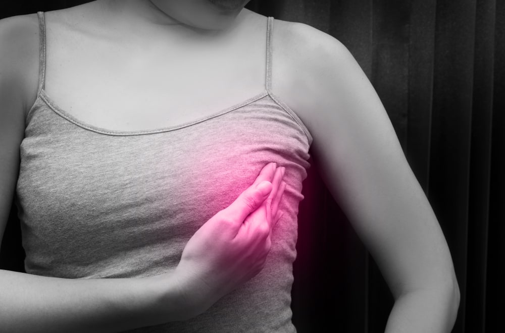Visuel de sensibilisation montrant une douleur dans la zone mammaire